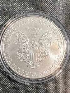 lot 62 image: 2008 AMERICAN SILVER EAGLE IN AIRTITE