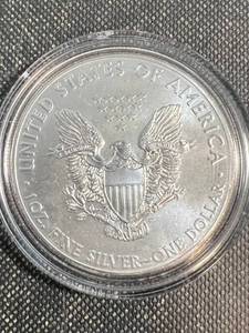 lot 76 image: 2014 AMERICAN SILVER EAGLE IN AIRTITE