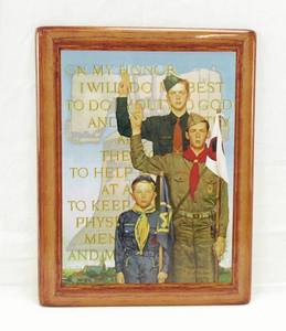 lot 89 image: Norman Rockwells Boy Scouts of America On My Honor Ceramic and Metal Plaque