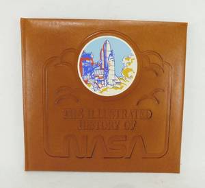 lot 200 image: Vintage 1986 The Illustrated History of NASA Leather Bound Book by Robin Kerrod