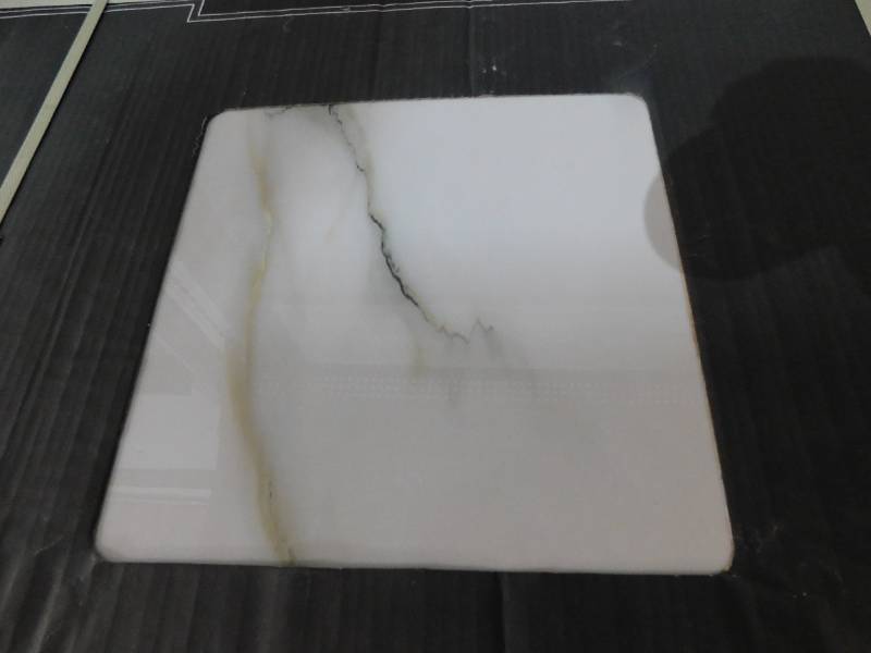 lot 214 image: MSI  White Calacatta Bianco 24 in. x 24 in. Polished Porcelain Floor and Wall Tile (16 sq. ft.Case)