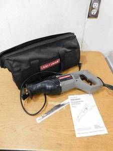 lot 58 image: Electric Craftsman Sawzall with bag
