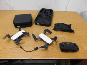 lot 138 image: (2) DJI Spark Portable Mini Drone Quadcopter Starters Bundle (Alpine White)