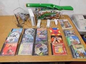 lot 93 image: Nintendo Wii System With Gun & Extra playstation & PC Games