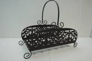 lot 33 image: Metal log rack  magazine holder