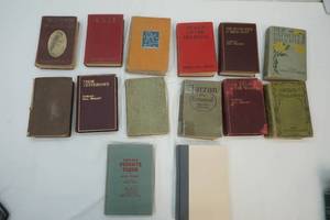 lot 275 image: variety of old hard cover books