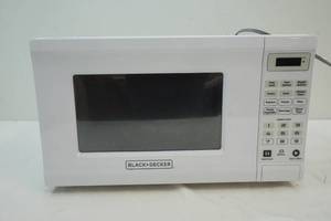 lot 304 image: Microwave oven