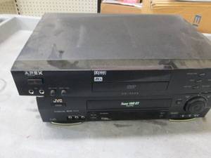 lot 85 image: dvd player and vhs player both powe...