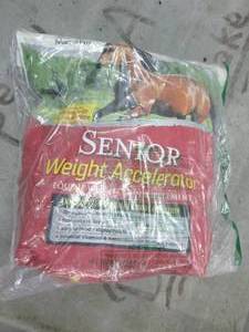 lot 62 image: 8lb bag of senior weight accelerato...