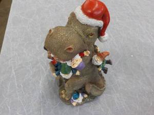 lot 328 image: dino with gnomes ...