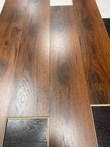 lot 116 image: 309 SF of Mohawk Water Resistant Easy Install Laminate Flooring - 7.5x48x8mm - A