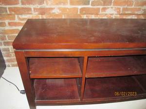 lot 31 image: Wood low table with shelves...