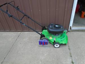 Lawn Boy push mower. Tested & works. As shown.
