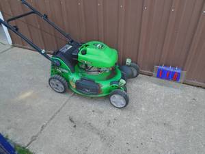 Lawn Boy lawn mower. Tested & works. As shown.