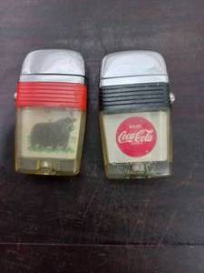 lot 18 image: Two Vintage Vu Lighters By Scripto