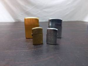 lot 39 image: 4 Vintage Zippo Style Lighters