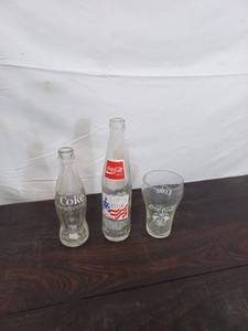 lot 57 image: Three Coca-Cola Items