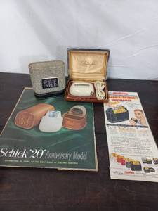 lot 70 image: Two Vintage Shavers And Ephemera