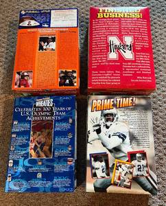 lot 217 image: (4) Wheaties Boxes - Olympics, Deion Sanders, Nebraska Cornhuskers, and NFL Quarterbacks