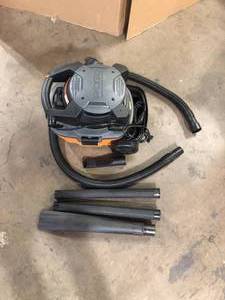 lot 17 image: RIDGID 4 Gallon 6.0 Peak HP WetDry Shop Vacuum with Detachable Blower, Fine Dust Filter, Locking Hose and Accessories   Customer Returns See Picturse