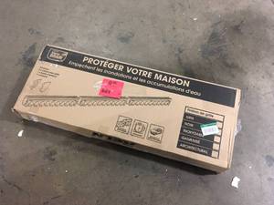 lot 23 image: RELN Storm Drain Series 5 in. W x 5.25 in. D x 39.4 in. L Channel Drain Kit with Black Grate (3-Pack) Customer Returns See Pictures