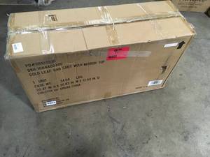 lot 29 image: Home Decorators Collection Gold Leaf Metal and Glass Rolling Bar Cart with Glass Top (30 in. W x 33 in. H) Customer Returns See Pictures