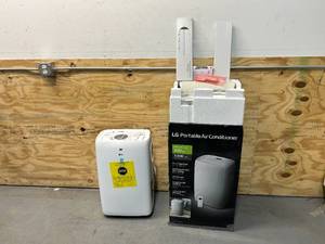 lot 114 image: LG 7,000 BTU (DOE) 115-Volt Portable Air Conditioner LP0721WSR Cools 300 Sq. Ft. with Dehumidifier Function and LCD Remote
