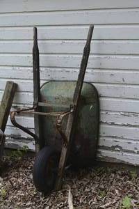 lot 10 image: Wheelbarrow for dcor has holes