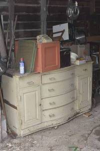 lot 29 image: Dresser with Glass Bridge PullsKnobs and contents on top