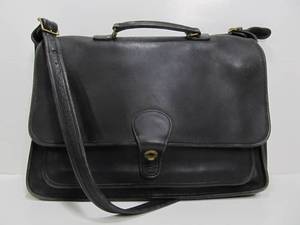 lot 56 image: Larger Size Vintage COACH Black Leather Purse