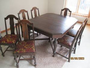 Walnut table with 7 chairs, hand bu...