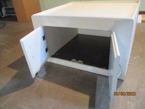Wood cabinet measures 27 x30 and 1...