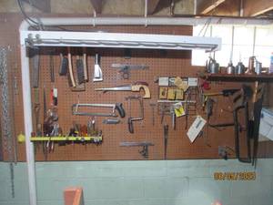 Pegboard display filled with hand t...