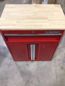 lot 29 image: Husky Ready-to-Assemble 24-Gauge Steel 1-Drawer 2-Door Garage Base Cabinet in Red (28 in. W x 33 in. H x 18 in. D)  Customer Returns See Pictures