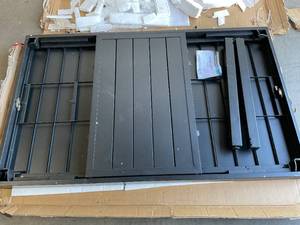 lot 135 image: Phi Villa Black Expandable Rectangle Metal Patio Outdoor Dining Table