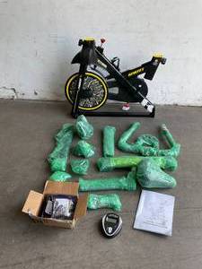 lot 145 image: PooBoo Magnetic Resistance Indoor Cycling Bike with LCD Monitor, Ipad Mount & Comfortable Seat Cushion