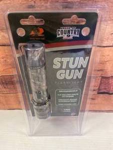 lot 64 image: New Stun Gun Flashlight