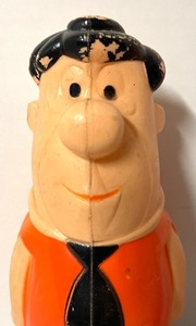 lot 108 image: Vintage Fred and Pebbles Flintstone Plastic Coin Banks