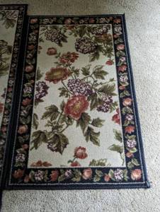 lot 28 image: Three Piece Floral Accent Rug Set