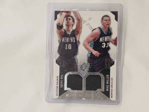 lot 19 image: Pau Gasol - Mike Miller 2004 Upper Deck Winning Combos Game-Worn Relic Patches
