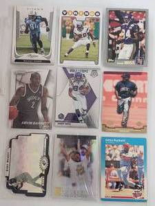 lot 51 image: Album Sleeve of 9 Cards 3x Randy Moss, Adrian Peterson, Kevin Garnett, Torii Hunter, 3x Kirby Puckett