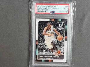 lot 86 image: Karl-Anthony Towns 2015 Panini Donruss The Rookies No. 21, PSA Mint 9