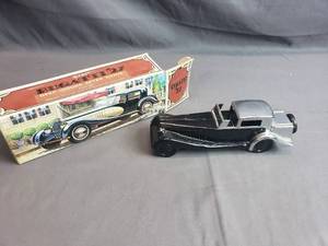 lot 111 image: Avon Bugatti 27 After Shave Bottle
