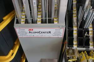 lot 58 image: Ace Hardware Slotted Storage Rack With Brand Aluminum ProductsInventory