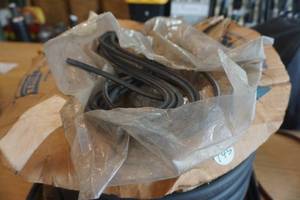 lot 145 image: Roll of Trim-Lock Inc Rubber Trim