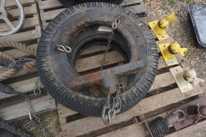 lot 204 image: Tire Rope Swing With Metal Base Anchor, Chain With Brand New Tire