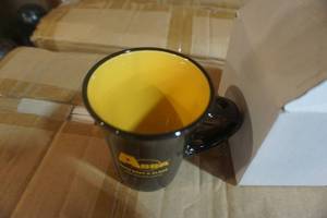 lot 192 image: 50 - Abra Auto and Glass Themed Coffee Cups