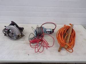lot 95 image: Skil Saw, Winch and extension Cord