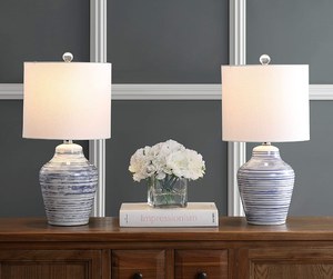 lot 367 image: SAFAVIEH Lighting Collection Maxton White Blue Stripe 21-inch Bedroom Living Room Home Office Desk Nightstand Table Lamp Set of 2 (OPEN BOX)