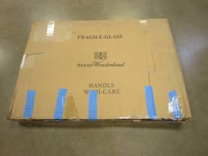 lot 359 image: Decor Wonderland Frameless Oval Beveled Mirror - 24in. x 36in.